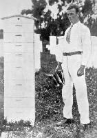 An example of a very successful season: the beekeeper with a hive nearly as high as himself.