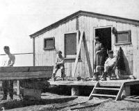 Boat builders at work on a punt.