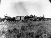 The men pack up the traction engine after threshing, Moderate farm, Bennetts district, Canterbury