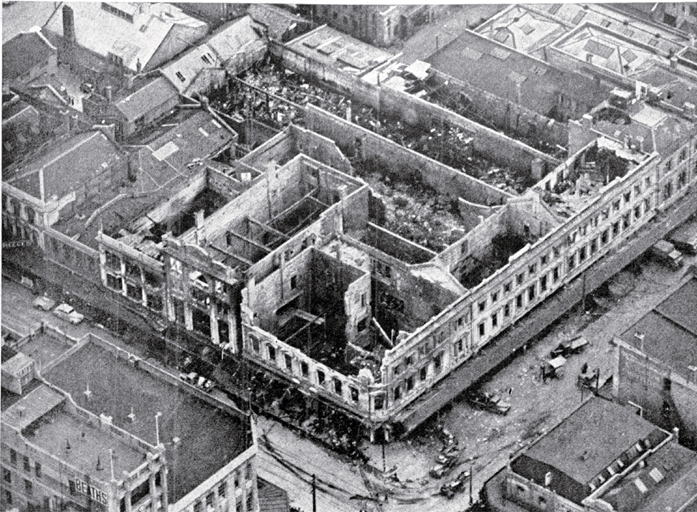 Aerial view of the gutted shell of the three-storied department building 