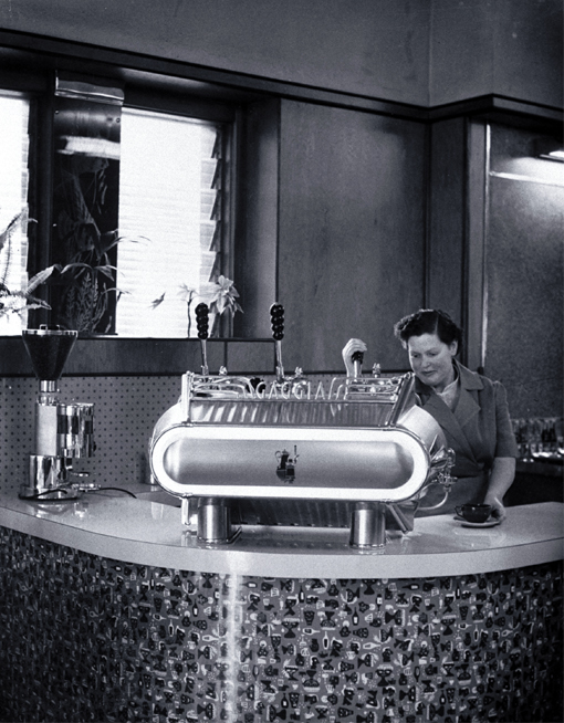 Woman serving expresso coffee at Fails Cafe, 82 Cashel Street, near the Bridge of Remembrance 