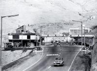 Administration building and portal on the Heathcote side of the Christchurch-Lyttelton Road Tunnel. Note toll booths. 