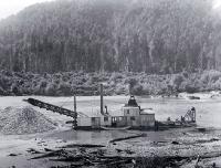 A gold dredge on the Buller River, West Coast 