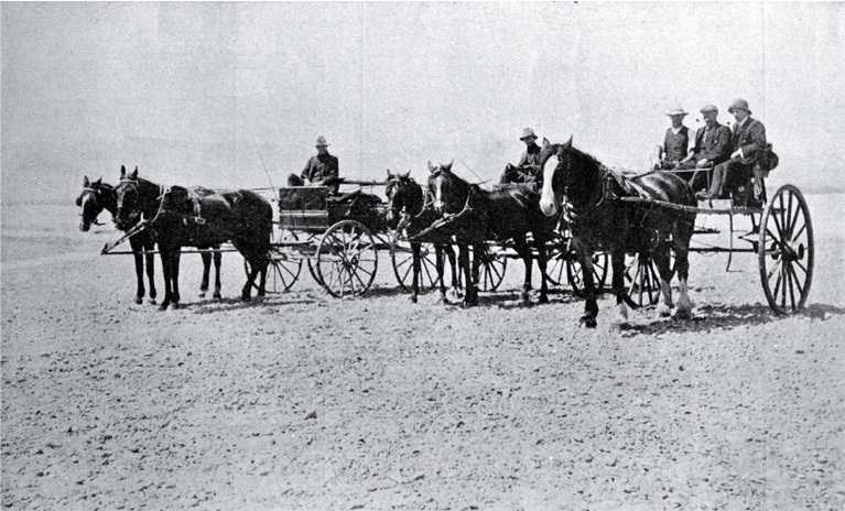 Horses and carriage at the Waiau River Bed, after crossing the stream from Cheviot, North Canterbury 