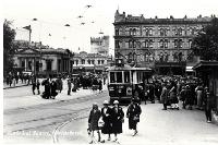 Pedestrians and a tram in Cathedral Square, Christchurch 