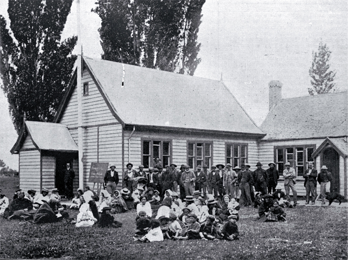 Outside the polling booth, Kaiapoi : people awaiting the results of the Southern Maori Electorate, 1902 Maori election.